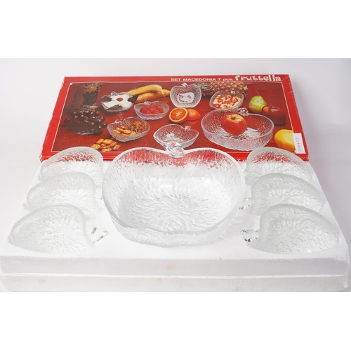 313 - Three new boxed vintage glass fruit salad/dessert sets.