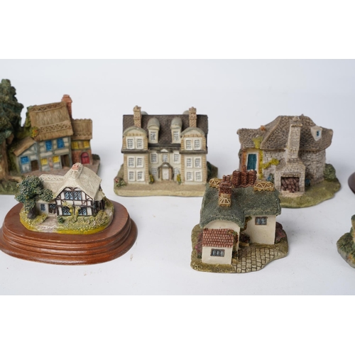 319 - A large lot of cottage ornaments by Loenardo, Academy, Minster giftware and more.