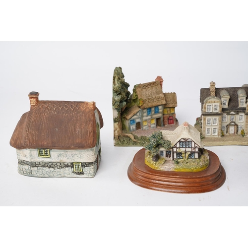 319 - A large lot of cottage ornaments by Loenardo, Academy, Minster giftware and more.