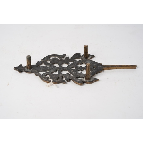 338 - A vintage brass trivet.