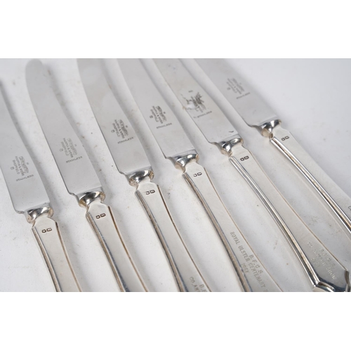 339 - A set of six Mappin & Webb sterling silver handled presentation knives.