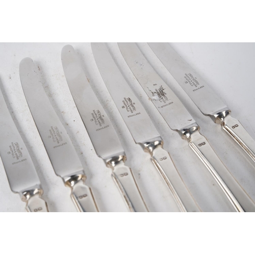 339 - A set of six Mappin & Webb sterling silver handled presentation knives.