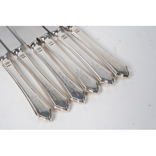 339 - A set of six Mappin & Webb sterling silver handled presentation knives.