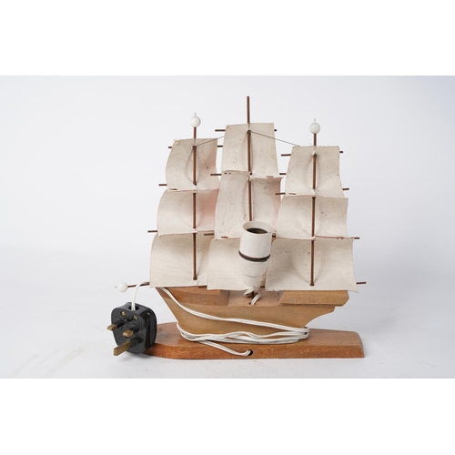 341 - A vintage wooden sailing ship table lamp.