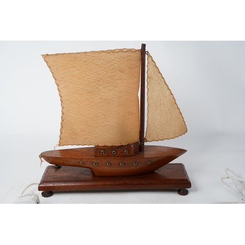 345 - A vintage electric light up wooden sailing ship.