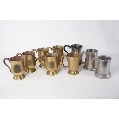 362 - A lot of brass lacquered tankards and more.