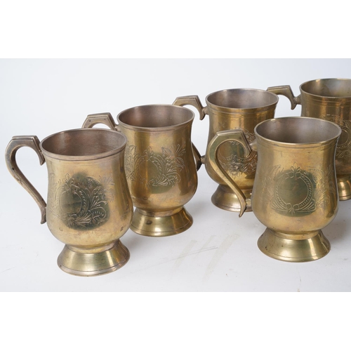 362 - A lot of brass lacquered tankards and more.