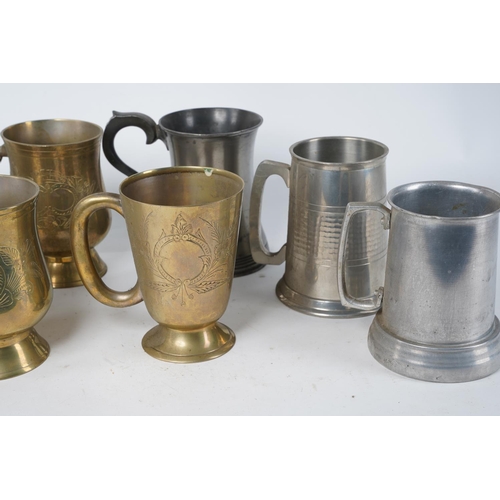 362 - A lot of brass lacquered tankards and more.