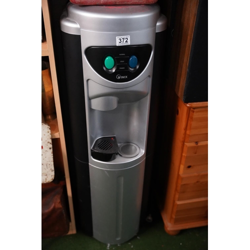 372 - A floor standing water dispenser.