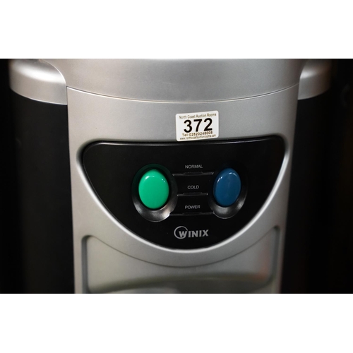 372 - A floor standing water dispenser.