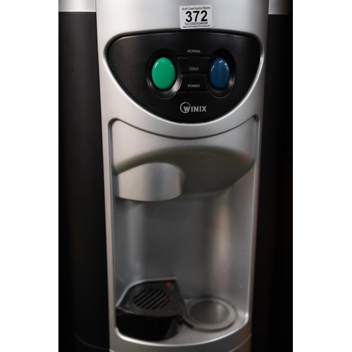 372 - A floor standing water dispenser.