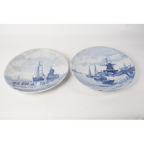 377 - A pair of antique blue and white patterned plates.