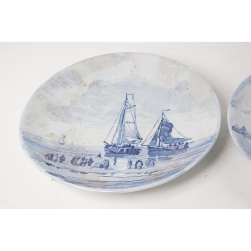 377 - A pair of antique blue and white patterned plates.