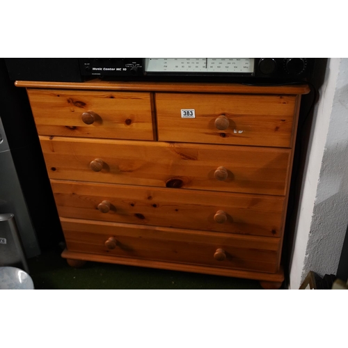 383 - A pine chest of five drawers.