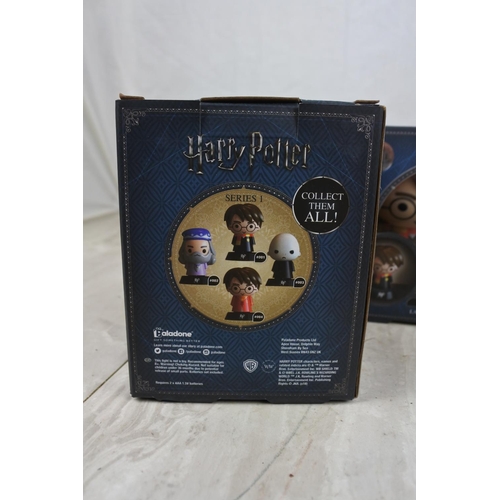 426 - Three boxed Harry Potter lights.