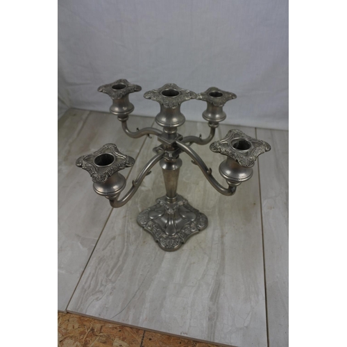 430 - A five branch silver plated candelabra.