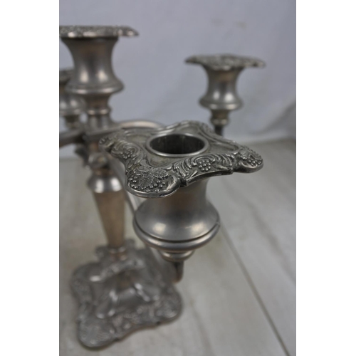 430 - A five branch silver plated candelabra.