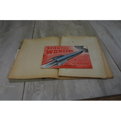 445 - An interesting vintage scrapbook and contents.