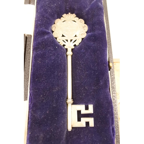 446 - A stunning cased presentation key, inscribed on front, 