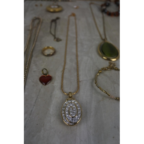 452 - A large lot of various vintage jewellery, earrings and more.