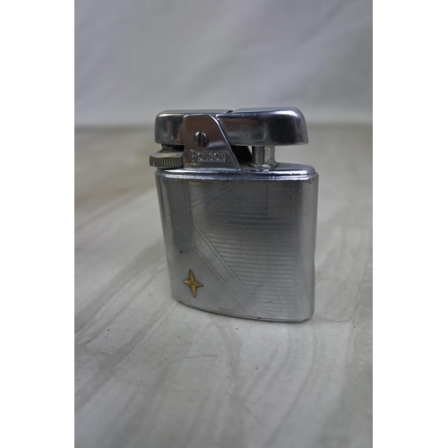 455 - A large collection of vintage assorted pocket lighters to include Ronson and a vintage Panther Torch... 