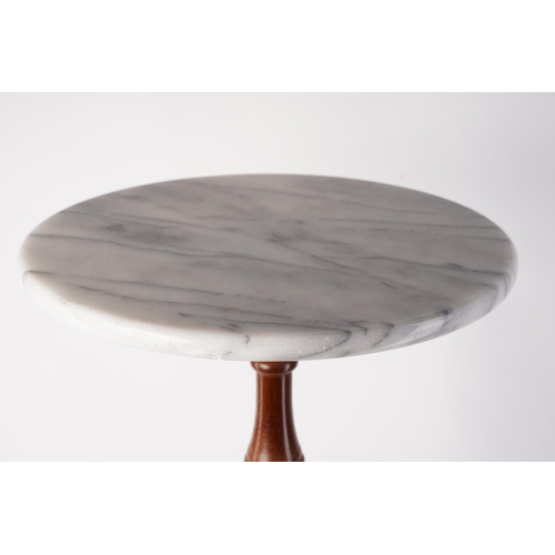 574 - A mahogany based wine table with marble top.