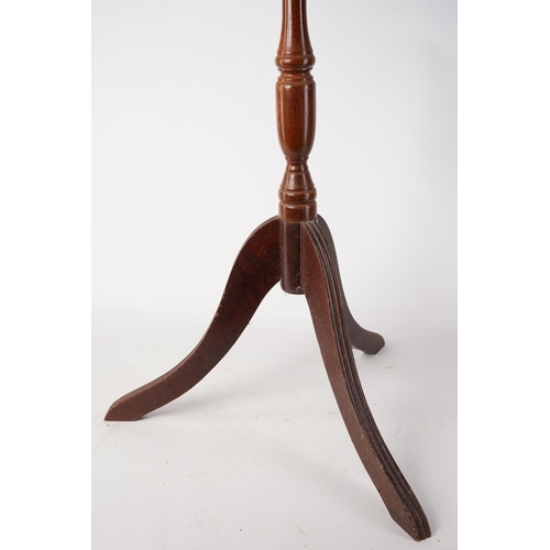 574 - A mahogany based wine table with marble top.