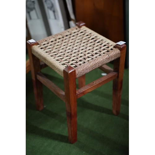 581 - A vintage woven topped stool.