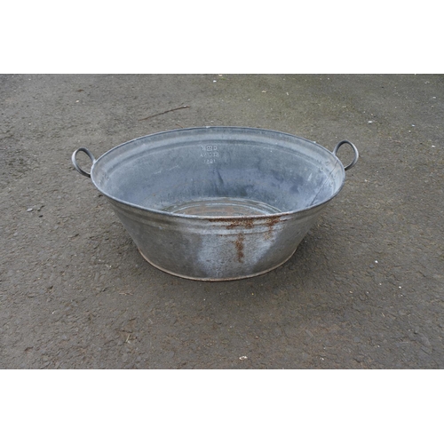 751 - A vintage Regina branded galvanized tin bath.