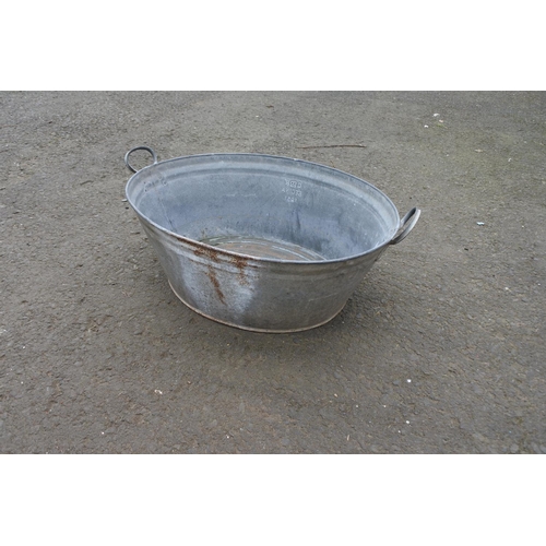 751 - A vintage Regina branded galvanized tin bath.