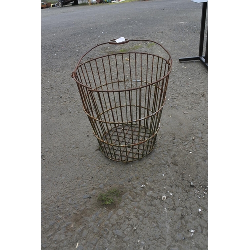 753 - A vintage metal basket.