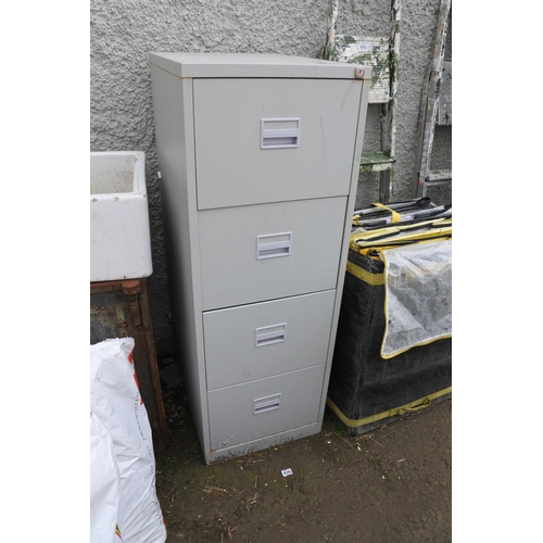 773 - A four drawer metal filing cabinet.