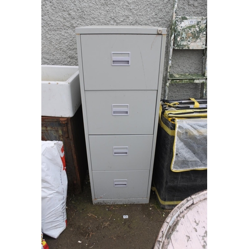 773 - A four drawer metal filing cabinet.