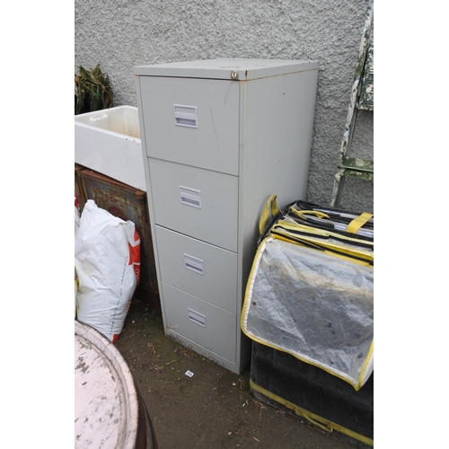 773 - A four drawer metal filing cabinet.