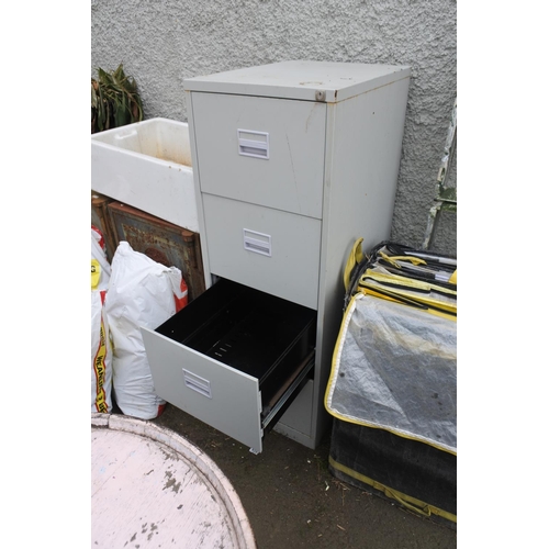 773 - A four drawer metal filing cabinet.