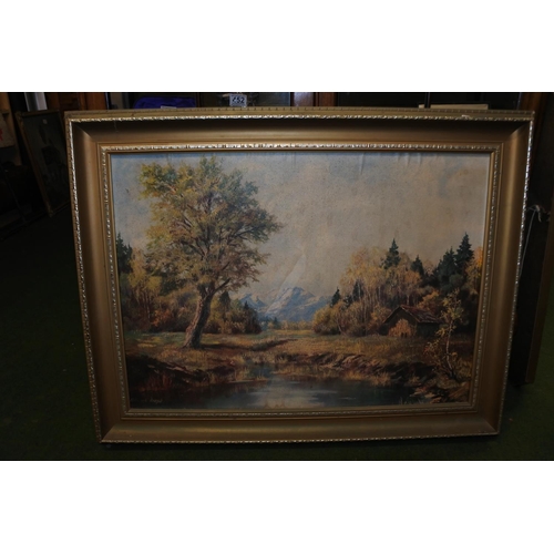 1169 - A vintage framed print of a mountain scene.