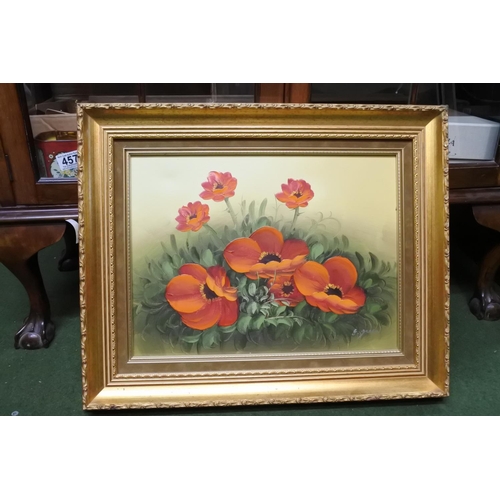 1170 - A gilt framed picture of poppies.