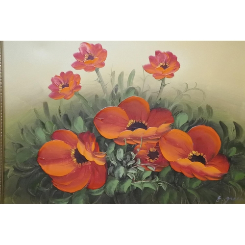 1170 - A gilt framed picture of poppies.