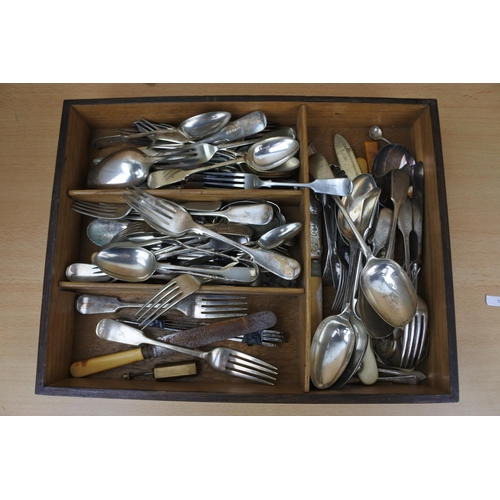 1180 - A wooden tray of assorted antique and vintage cutlery.