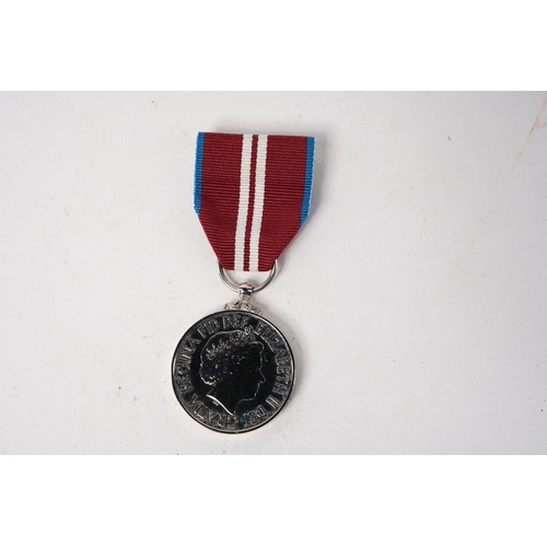 594 - A Queen Elizabeth II Diamond Jubilee Medal.