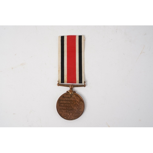 624 - A Special Constabulary Long Service Medal, presented to George Simpson.
