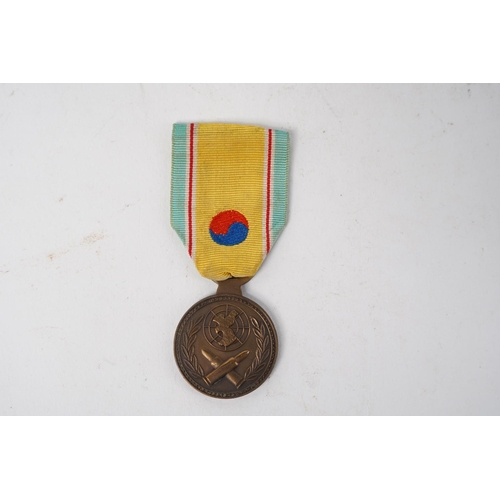 628 - A Korean War Service Medal : Republic of South Korea, engraved to rear 'C.S.Harmon'.