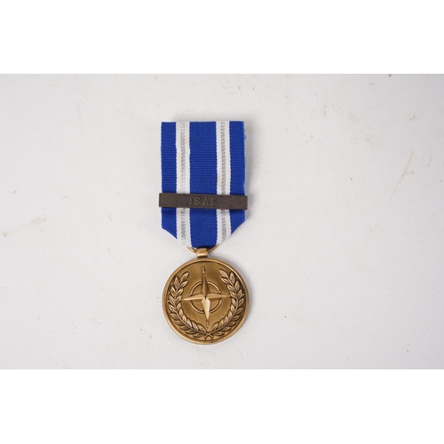 664 - A NATO 'In Service of Peace & Freedom' Medal.