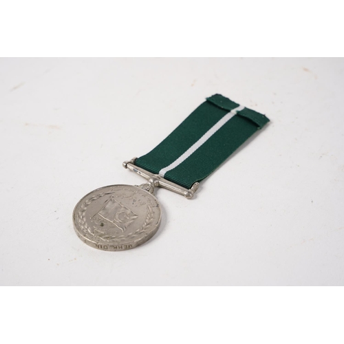 673 - A Pakistan Independence Medal, awarded to Mehr Din F/C 768.