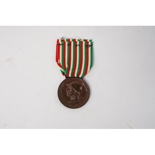 676 - A WW1 Italian War Service Medal.