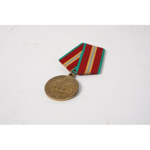 693 - A Russian/ USSR '70 years armed forces' medal.