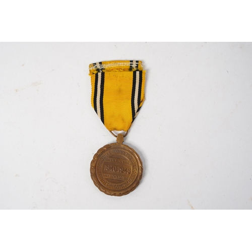 694 - A Belgian Commemorative Medal of the 1940–45 War.