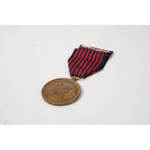 695 - A Belgian WW2 Volunteer Medal.