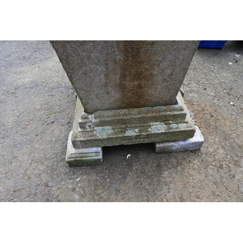 770 - A large pair of concrete planters on a plinth base and feet, measuring 27