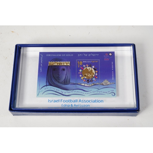 589 - A boxed glass paperweight 'Israel Football Association'.